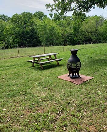 Enjoy roasting weiners or making smores with our new chiminea. Social distancing in the great outdoors couldn't be any more inviting!!