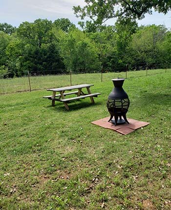 Enjoy roasting weiners or making smores with our new chiminea. Social distancing in the great outdoors couldn't be any more inviting!!